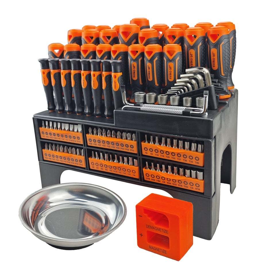 Set of tools including screwdrivers, bits, and a tray 