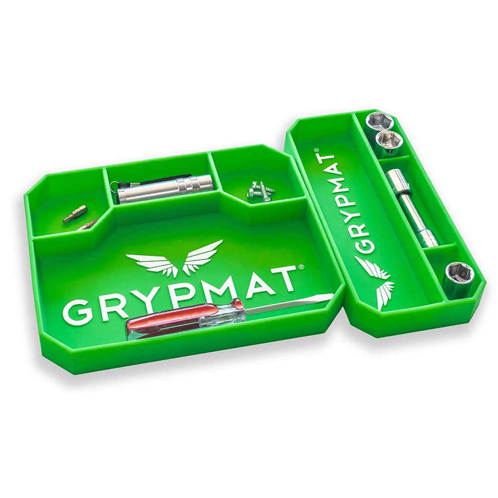 Green Grypmat with various tools on a white background